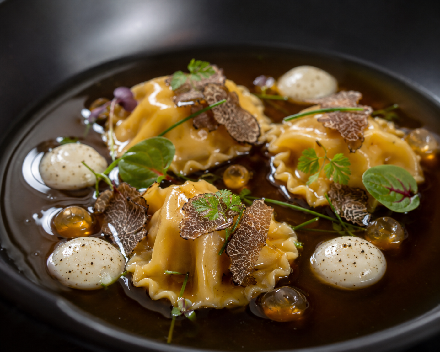 Black Truffle Agnolotti in Burnt Shallot Consommé