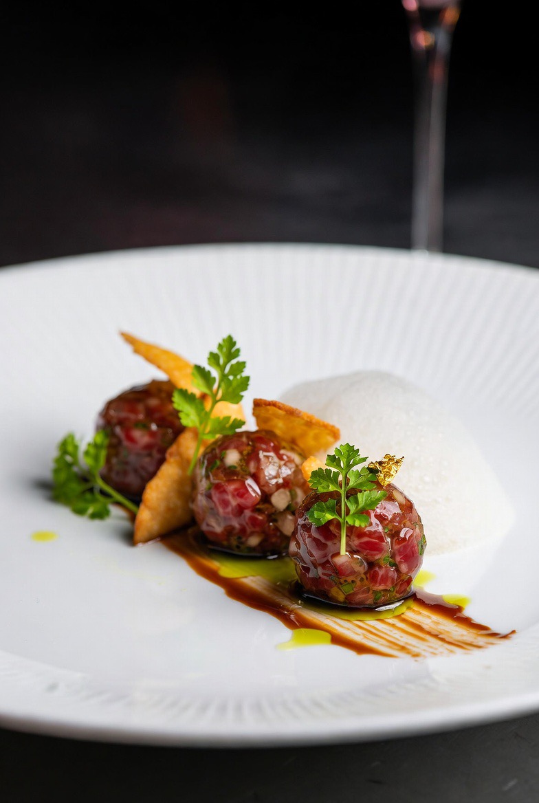 Wagyu Beef Tartare Spheres with Smoked Bone Marrow Foam and Pickled Shallot Crisp
